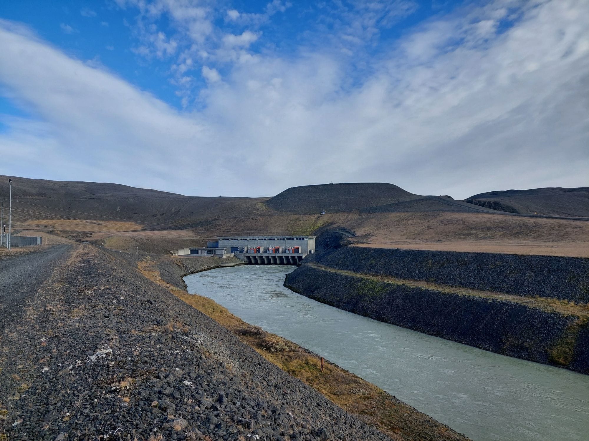 landscape with river and power station